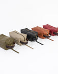 Leather dopp kit collection shot - 5 colors - durable leather - handmade in workshop at venn + maker