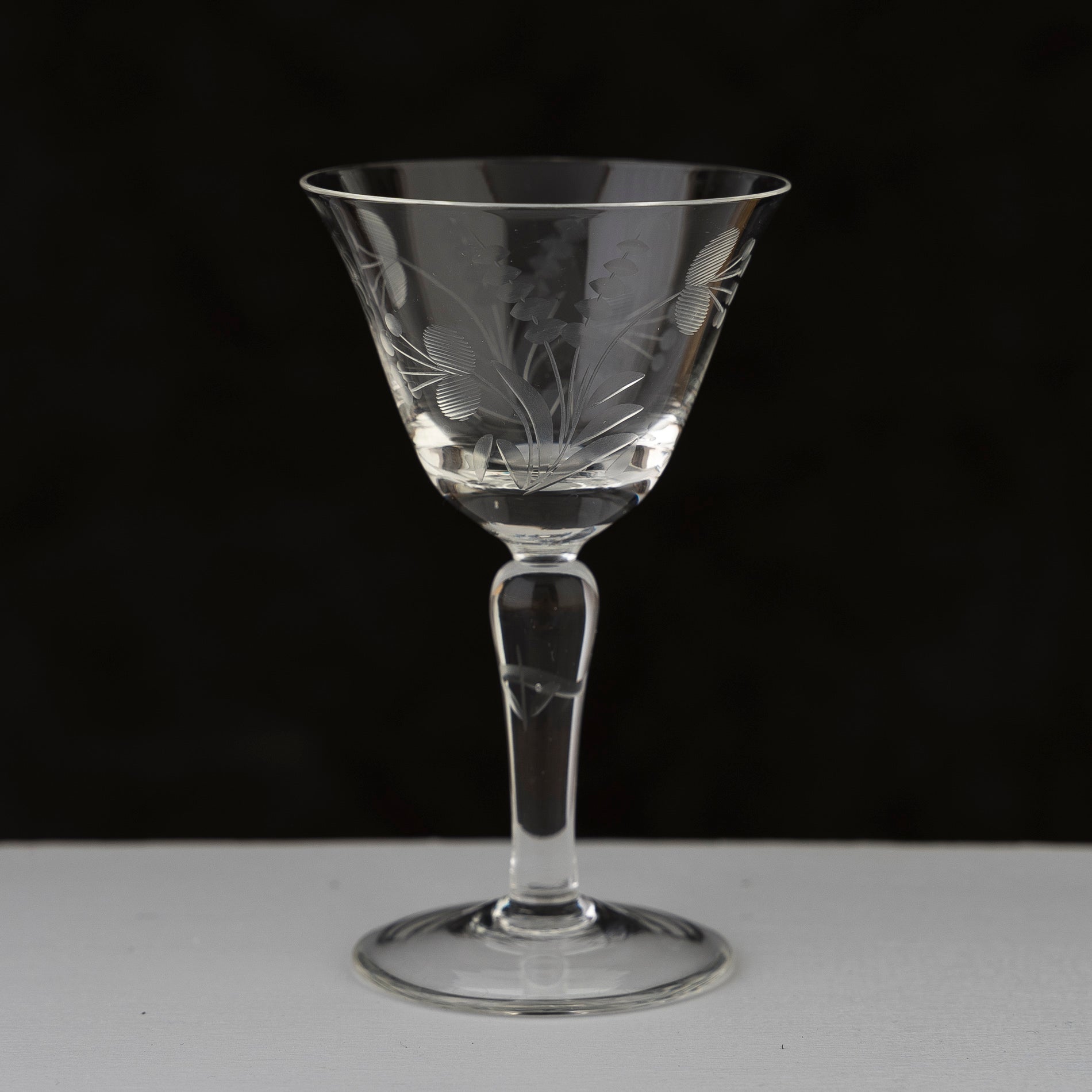 etched flower design in the 1930s cocktail glasses