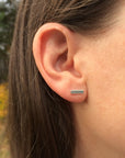 bar stud earrings on person - simple earrings - women's jewelry