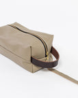 sand leather dopp kit - workshop at venn + maker - handmade in house - durable design - cosmetic bag - brown leather handle