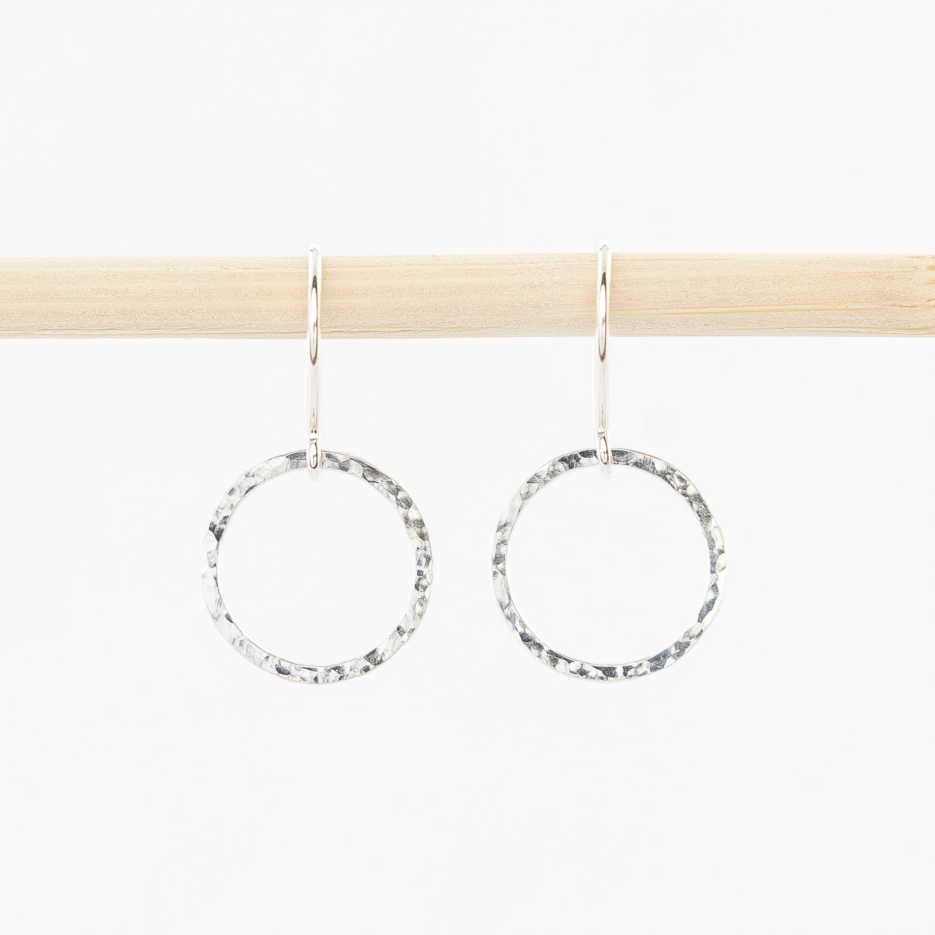 hoop drop earrings in sterling silver - hammered metal - french wire backs 