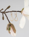 hammered gold teardrop earrings - handmade in Maine - lifestyle image - spring - blooming flowers 