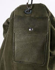 green leather pocket on the US army duffle - detail shot - up close image - vintage product