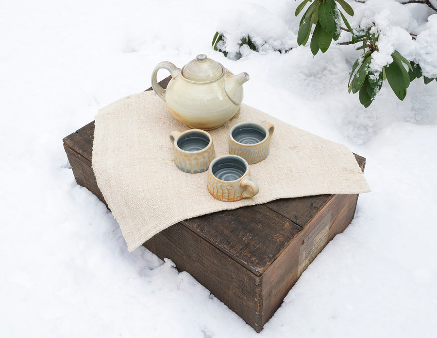 vintage placemat lifestyle shot - tea setting - cozy winter vibes - espresso mugs 