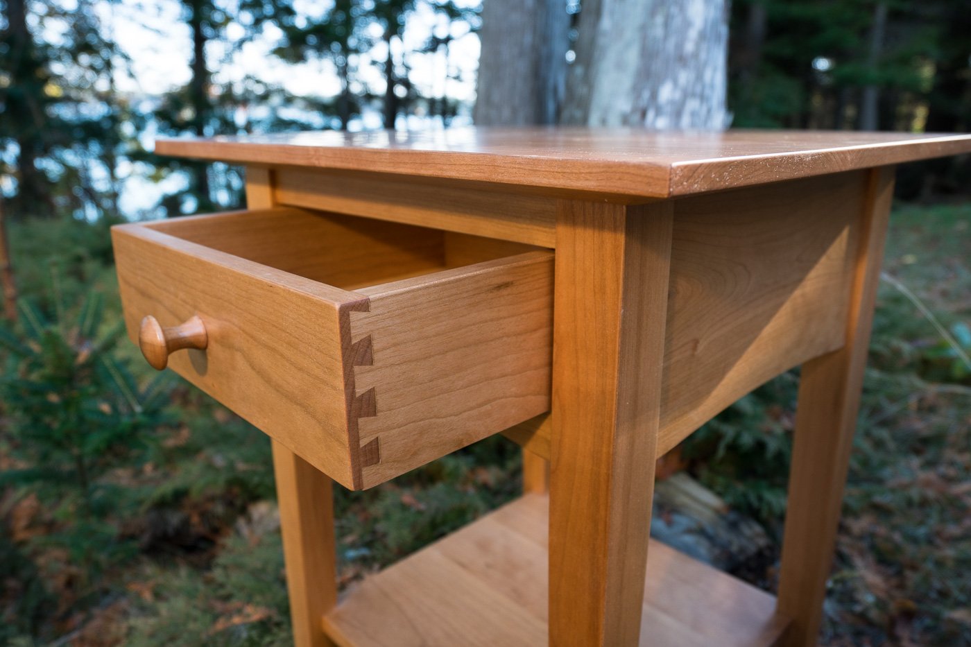 peaks point table in cherry - lifestyle image - natural wood - portland - maine - beckett street 