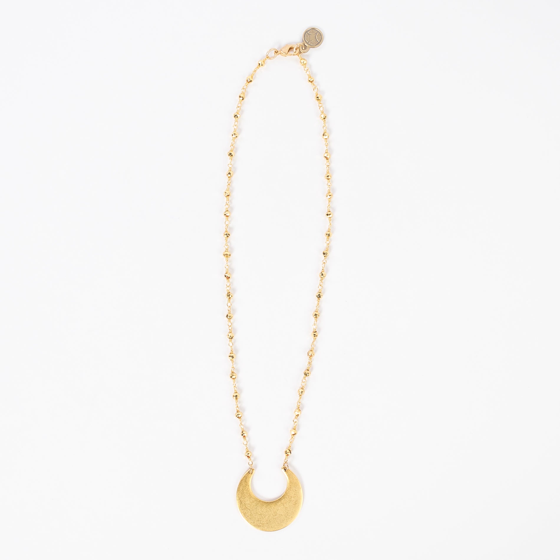 full view of the matte gold crescent moon necklace - lobster claw clasp