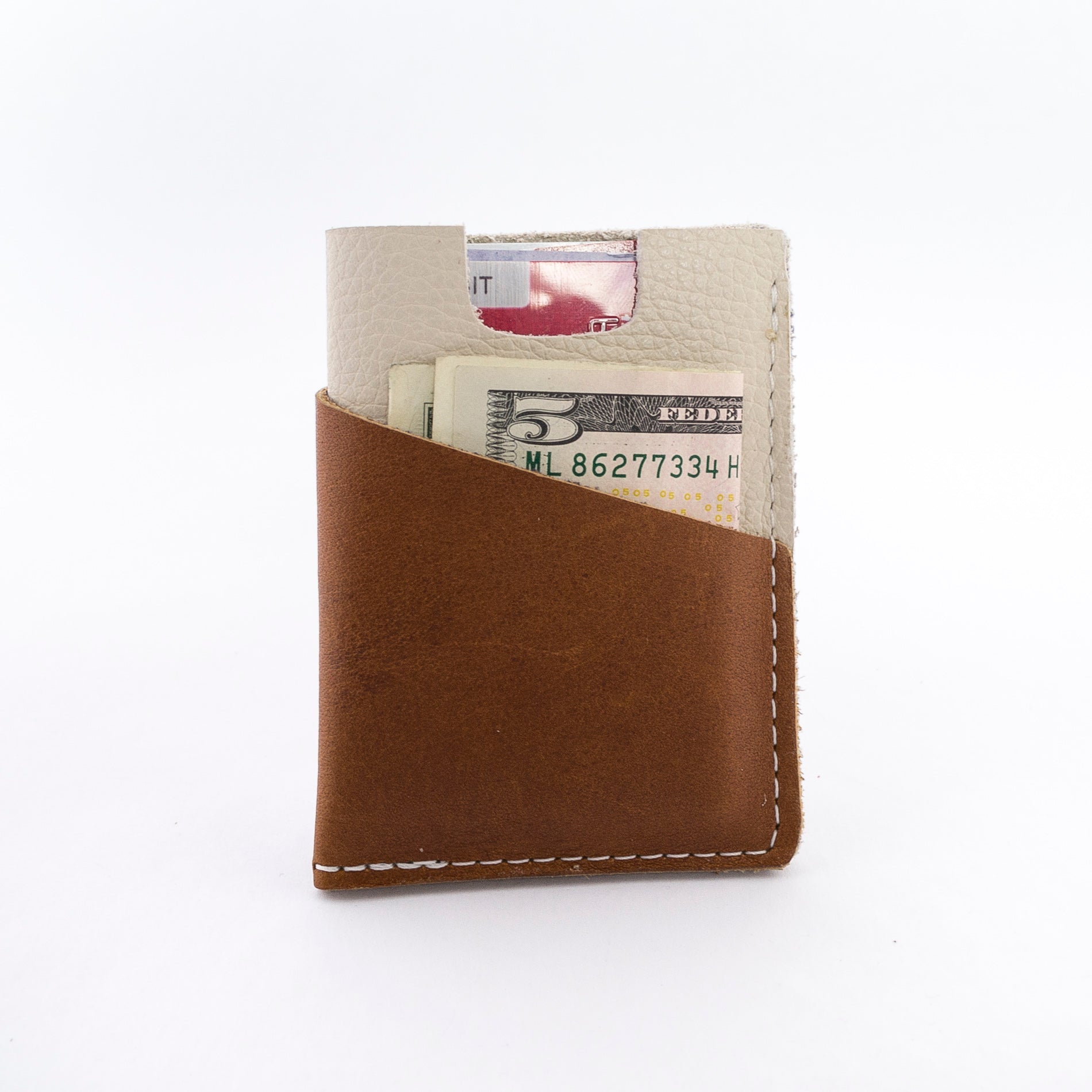 the brockman wallet with cash and cards - styled shot - in use 