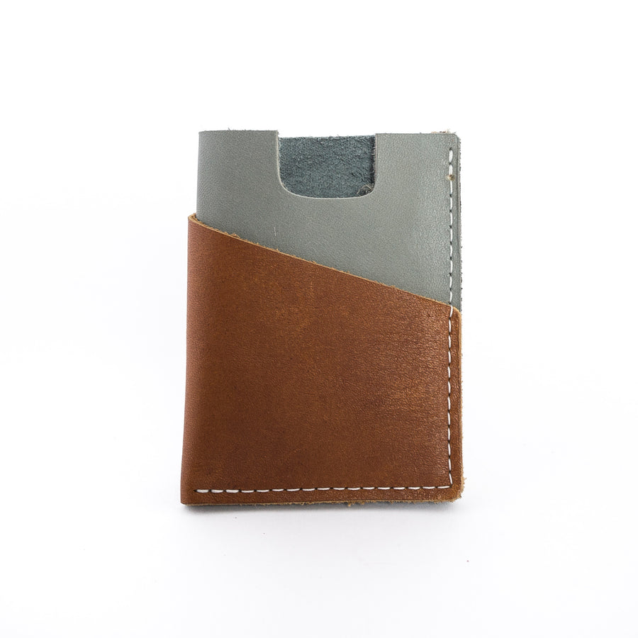 the brockman wallet in gray - cash and cards - minimalist design - front view 