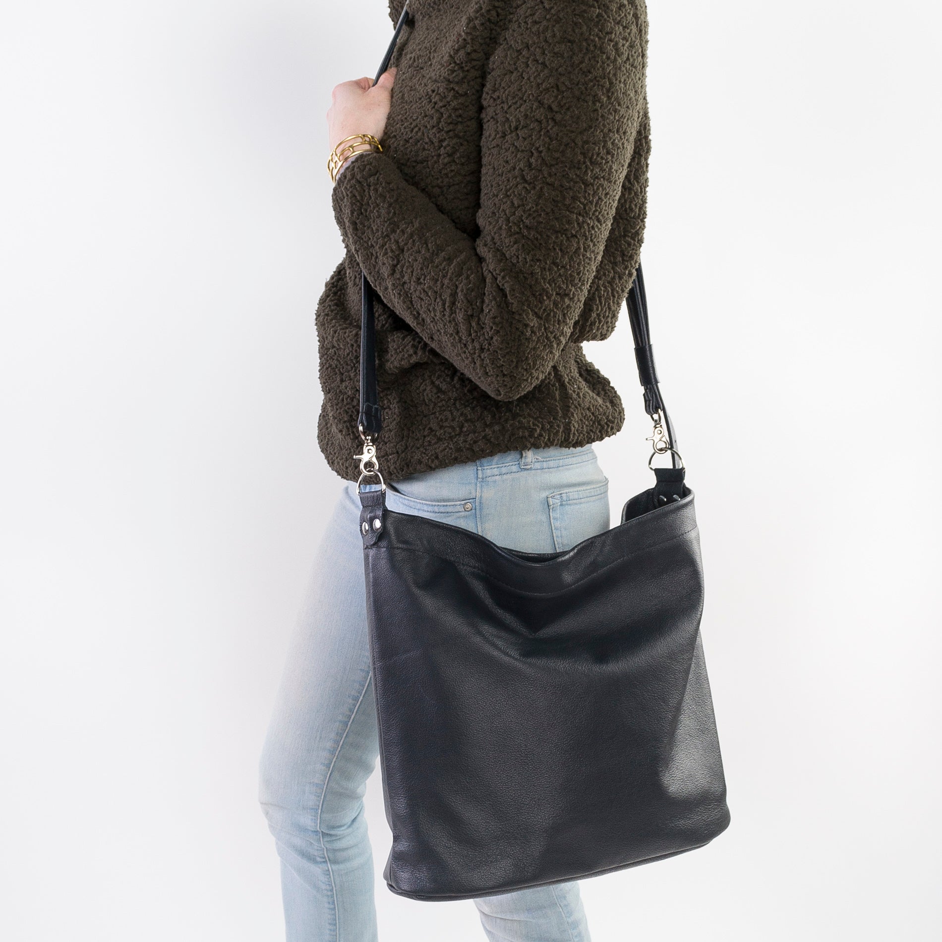 cross-body bag is a relaxed hobo design featuring a soft, slouchy, silhouette with enough room for storing everyday items