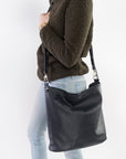 cross-body bag is a relaxed hobo design featuring a soft, slouchy, silhouette with enough room for storing everyday items