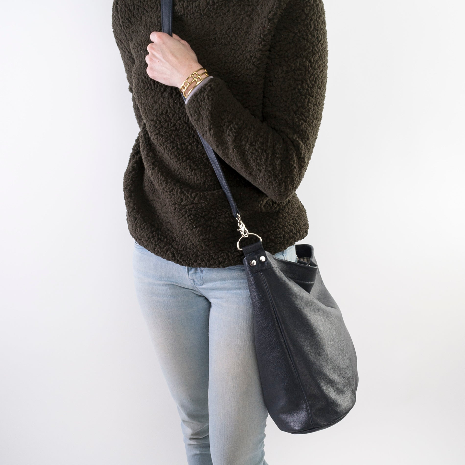 cross-body bag is a relaxed hobo design featuring a soft, slouchy, silhouette with enough room for storing everyday items