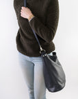 cross-body bag is a relaxed hobo design featuring a soft, slouchy, silhouette with enough room for storing everyday items